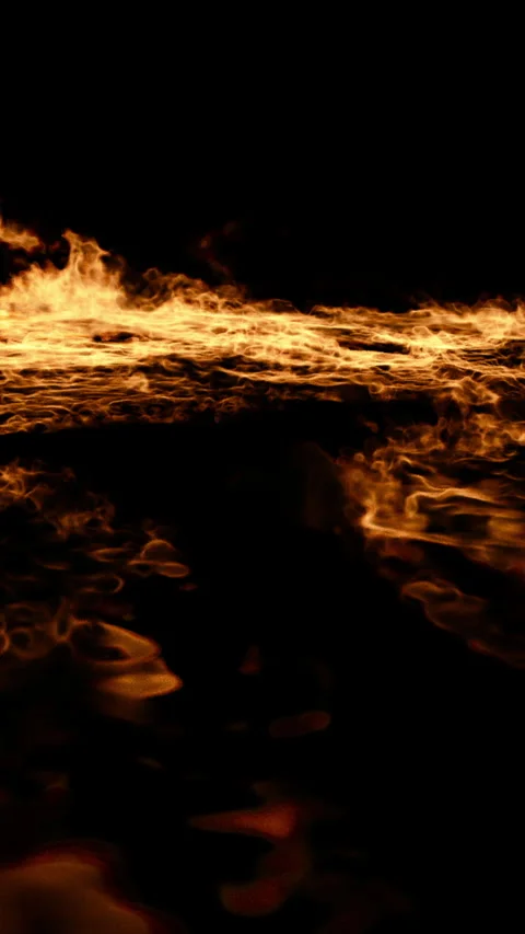 Raging fire spreading over a black background Stock Footage 347251153