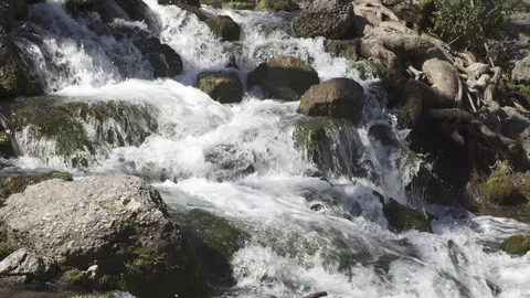 The raging flow of a mountain river like a waterfall Stock Footage 104829501