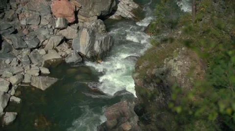The raging mountain river flows on a canyon between stones Stock-Footage 55524956