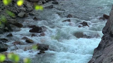 The raging mountain river flows on a canyon between stones rapids Stock Footage 55524976