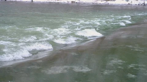 Raging mountain river. Full mountain river. The water is seething on the river Stock Footage 262998818