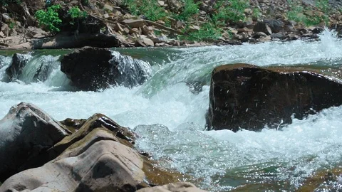 Raging Mountain river. Wildness of clean, clear water in the mountain river Video stock 90450898