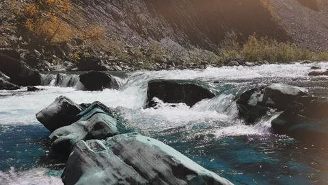 Raging Mountain river. Wildness of clean, clear water in the mountain river Stock Footage 92547026