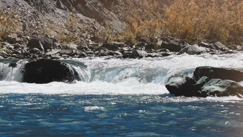 Raging Mountain river. Wildness of clean, clear water in the mountain river Stock Footage 92550979