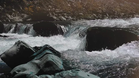 Raging Mountain river. Wildness of clean, clear water in the mountain river Stock Footage 92567516