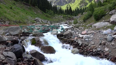 A raging river in the mountains. Video stock 152473715