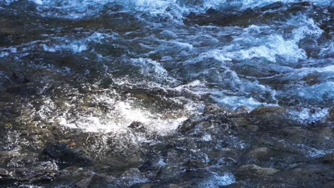 A raging river in the mountains Видео 193334106