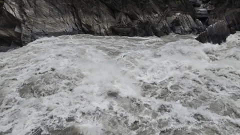 Raging River with White Water in Steep Gorge Stock Footage 340130231
