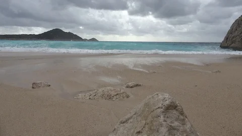 Raging sea and clean sand at the winter Kaputas beach Stock Footage 104583953