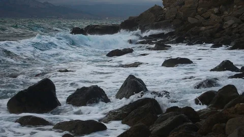 Raging sea elements turquoise waves and white foam Stock Footage 99724959