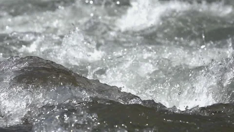Raging stream of water. Slow motion 240 fps Stock Footage 153389492