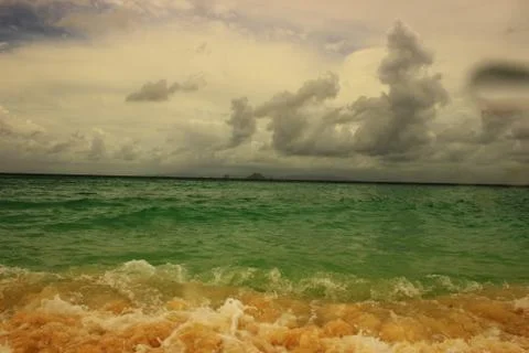 Raging surf in the background the weather changes Stock Photos