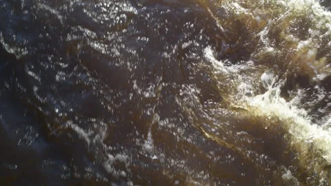 Raging Water Black River Spring flooding water Upper Peninsula Michigan Video stock 312350251