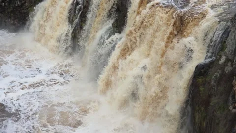 Raging waterfall cascading in slow motion Stock Footage 338311079