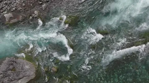 Raging Waterfall Over Dark Rocks in Narrow Gorge Stock Footage 310613765
