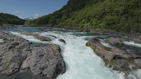 Raging Waterfall Over Dark Rocks in Narrow Gorge Stock Footage 310614317