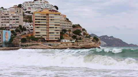 Raging waves rolling on Poniente Beach in Benidorm, Costa Blanca, Spain Stock Footage 333900123