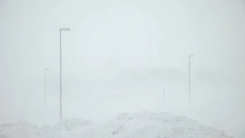 Raging winter snow storm in small Icelandic town Stock Footage 127596990