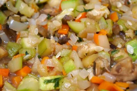 Ragout is cooked. Vegetable stew is cooked on gas stove Photos