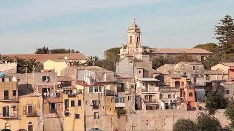 Ragusa sicily italy town medium shot church buildings homes houses on hill Stock Footage 252155826