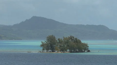 Raiatea motu in lagoon 2 Stock Footage 5504158
