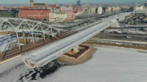 Rail Baltica Construction Beside Riga Railway Bridge Over Frozen Daugava Latvia Stock Footage 345473518