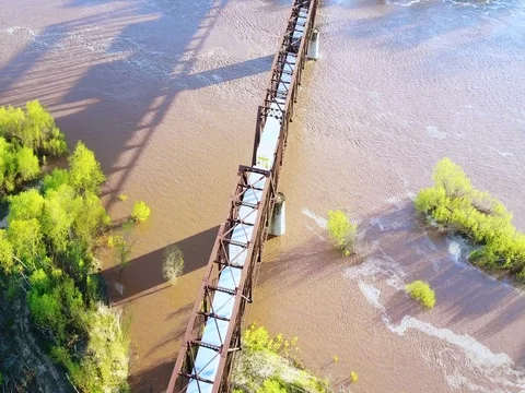 Rail Bridge  and Train over a flowing river Video stock 75167293