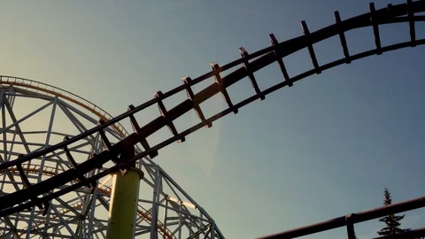 Rail coaster ride over the setting sun. Stock Footage 128663345
