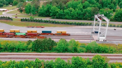 Rail Gantry Crane Aerial - Container Lifting Machine at Intermodal Yard Stock Footage 340176538
