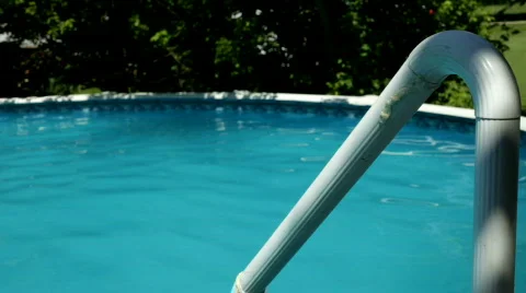 Rail going into Swimming pool on summer day Vídeo Stock 767523