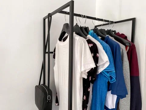 Rail hanger on which things are hung.  Care and storage of things.  Home acce Stock Photos