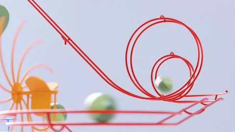 Rail marble run machine. Steel track rolling ball sculpture. Wire marble race. Stock Footage 256058719