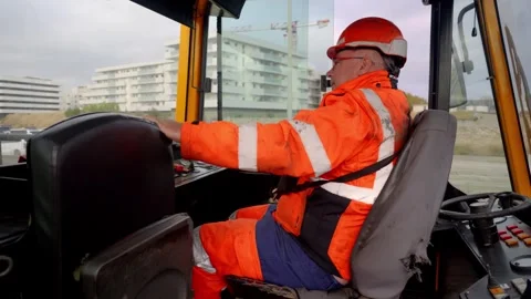 Rail Operator at Controls Inside Locomotive Cab Profile Stock Footage 338371658