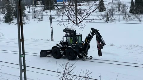 Rail road cleaning machine train clearing ice snowfall railway tracks railroad 스톡 동영상 303844741