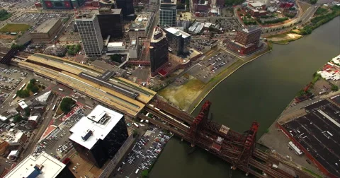 Rail terminal platforms and a rust-brown lift bridge Stock Footage 63064430