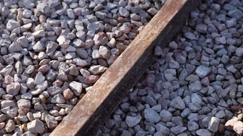Rail Track Close Up With Rusted Rail And Crushed Stone Ballast Stock-Footage 337581915
