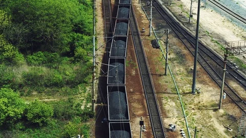 Rail: a train loaded with coal goes on rails Stock Footage 116180246