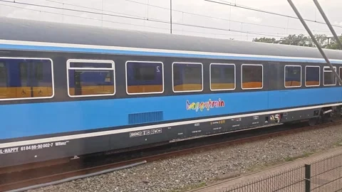 Rail Workers and Trains at Dutch Railyard Seen From Passing Train Stock Footage 335461100