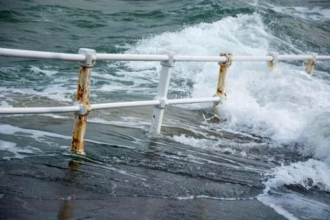 Railing and wave Foto stock