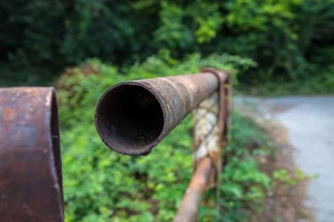 Railing pipe of a bridge in the countryside Stock Photos