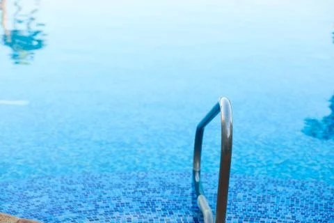 Railing in the pool Stock Photos