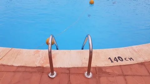 Railings ladder to the pool Stock Footage 108050372