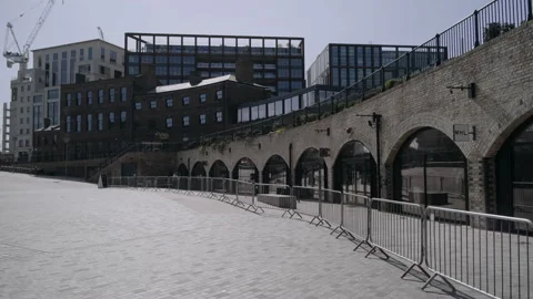 Railings outside closed shops in an empty city suburb Video stock 130278653
