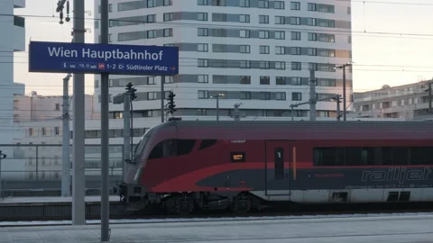 Railjet train on platform at Wien Hauptbahnhof. Vienna central station. Video stock 226434033