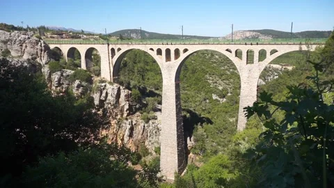 Railroad bridge over a deep canyon in Turkey Stock Footage 220794874