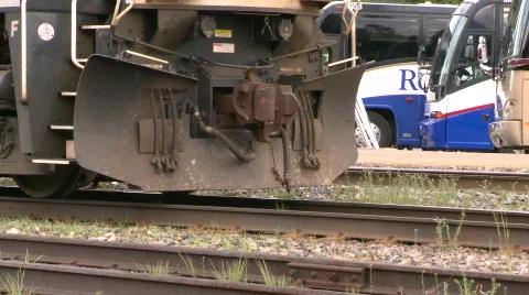 Railroad, freight train leaving slow, tight on wheels Stock Footage