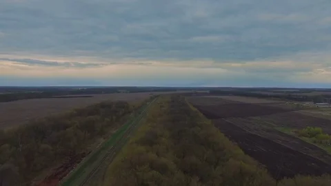 Railroad near forest at sunset Stock Footage 74635292