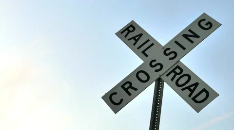 Railroad sign against gradient sky, RIGHT, 4K Stock Footage 47302761