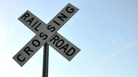 Railroad sign against gradient sky, LEFT, 4K Stock Footage 47339736