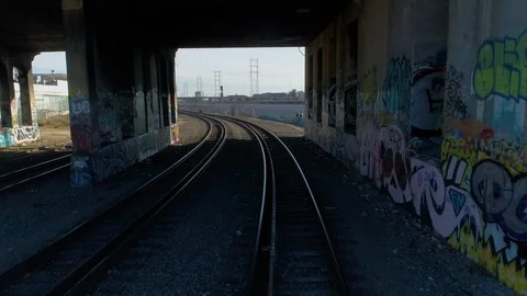 Railroad track under tunnel. Camera moving through 스톡 동영상 87533112